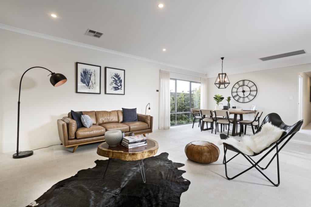 cowhide rug, leather couch, lamp shade