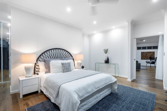 modern bedroom with a throw rug